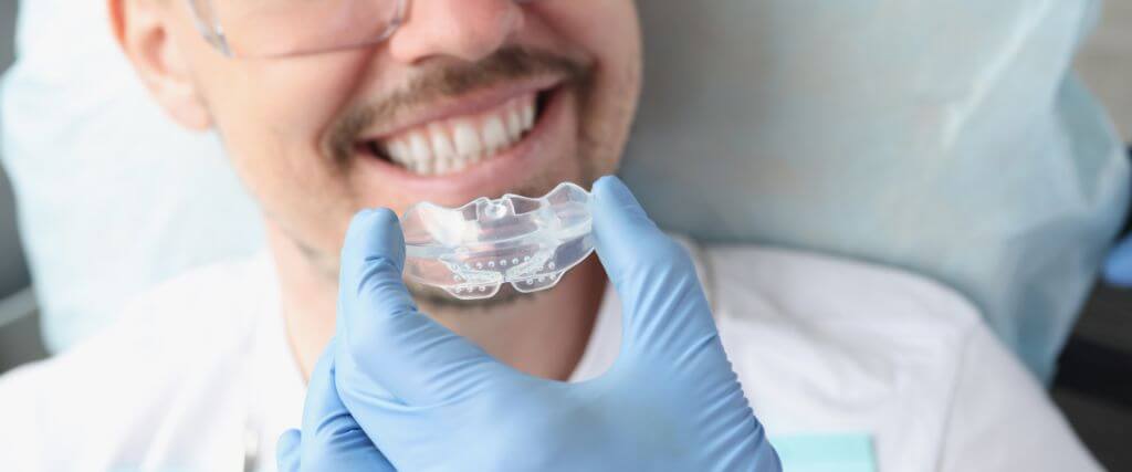 Night guards for teeth grinding how they protect your smile